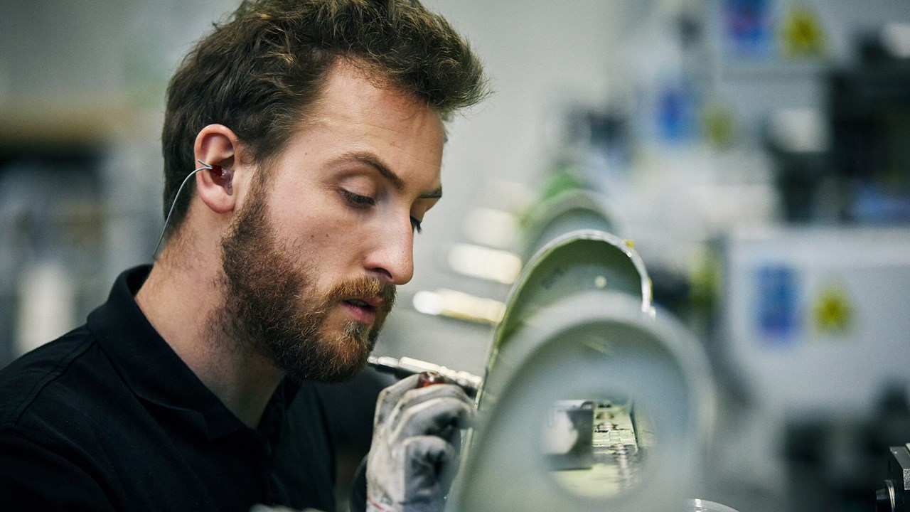 An employee checks Airbus spare parts